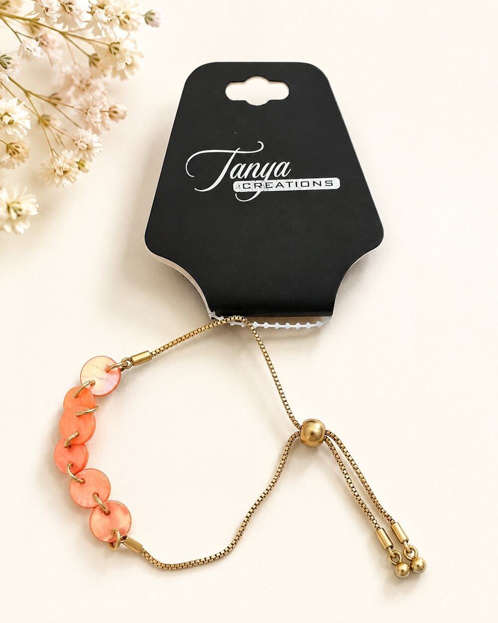 NWT Tanya Creations gold tone and peach coral adjustable bracelet
